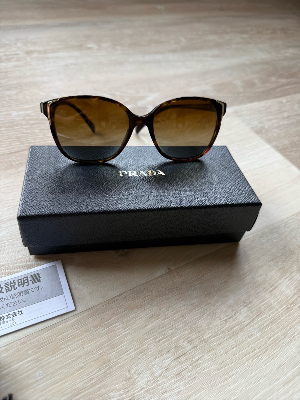 Prada Tortoiseshell Sunglasses with Brown Gradient Polarized Lenses and Gold